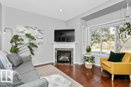 9109 98 Avenue, Edmonton, AB - Indoor Photo Showing Living Room With Fireplace