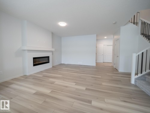 17527 7 Street, Edmonton, AB - Indoor Photo Showing Living Room With Fireplace
