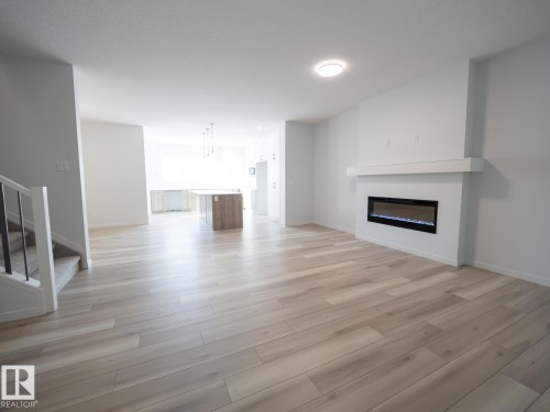 17527 7 Street, Edmonton, AB - Indoor Photo Showing Living Room With Fireplace