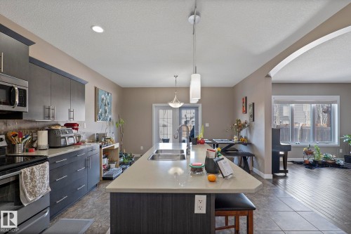 106 Hilldowns Drive, Spruce Grove, AB - Indoor Photo Showing Kitchen With Double Sink