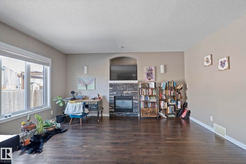 106 Hilldowns Drive, Spruce Grove, AB - Indoor Photo Showing Living Room With Fireplace