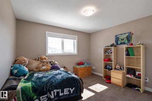 106 Hilldowns Drive, Spruce Grove, AB - Indoor Photo Showing Bedroom