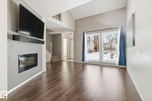 1 2020 105 Street, Edmonton, AB - Indoor Photo Showing Other Room With Fireplace