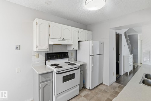 1 2020 105 Street, Edmonton, AB - Indoor Photo Showing Kitchen With Double Sink