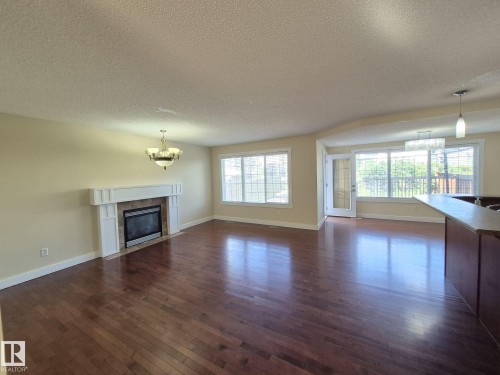 8361 Shaske Crescent, Edmonton, AB - Indoor Photo Showing Living Room With Fireplace
