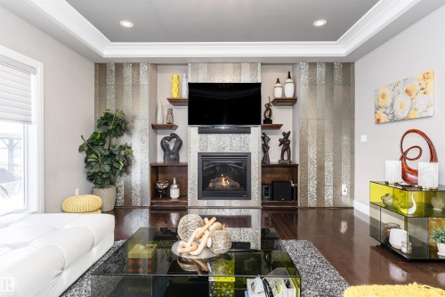 2410 Ashcraft Crescent, Edmonton, AB - Indoor Photo Showing Living Room With Fireplace