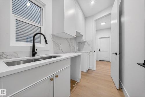 8924 Mayday Way Sw, Edmonton, AB - Indoor Photo Showing Kitchen With Double Sink