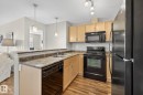 310 6070 Schonsee Way, Edmonton, AB  - Indoor Photo Showing Kitchen With Double Sink 