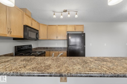 310 6070 Schonsee Way, Edmonton, AB - Indoor Photo Showing Kitchen