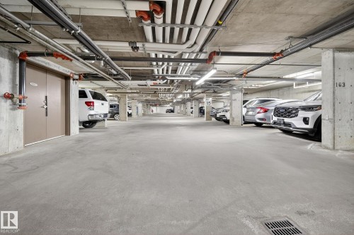 310 6070 Schonsee Way, Edmonton, AB - Indoor Photo Showing Garage