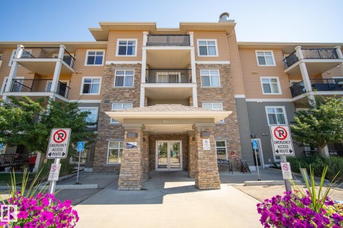 310 6070 Schonsee Way, Edmonton, AB - Outdoor With Balcony With Facade