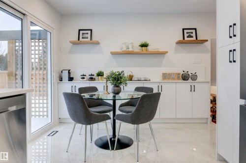 2712 41 Street, Edmonton, AB - Indoor Photo Showing Dining Room With Fireplace