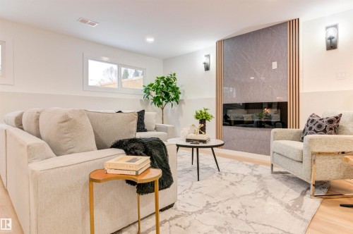 2712 41 Street, Edmonton, AB - Indoor Photo Showing Living Room With Fireplace
