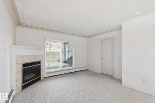 48 9908 80 Avenue Nw, Edmonton, AB - Indoor With Fireplace