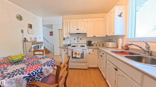 3122 142 Avenue, Edmonton, AB - Indoor Photo Showing Kitchen With Double Sink