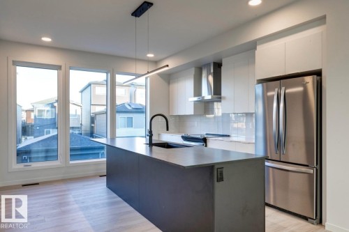 7539 Klapstein Link Link, Edmonton, AB - Indoor Photo Showing Kitchen With Upgraded Kitchen