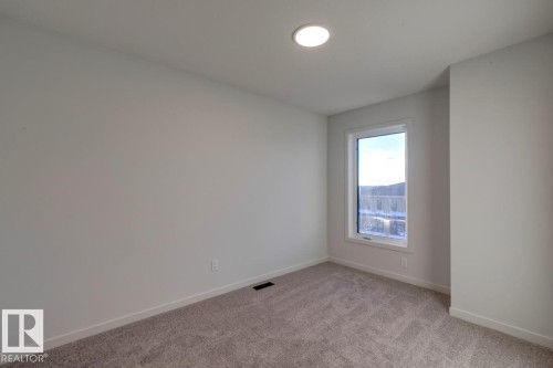 7539 Klapstein Link Link, Edmonton, AB - Indoor Photo Showing Other Room