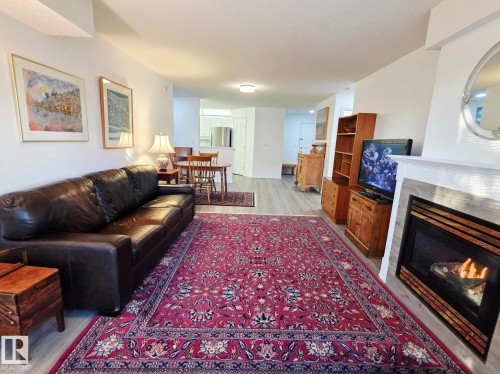 327 6703 172 Street, Edmonton, AB - Indoor Photo Showing Living Room With Fireplace
