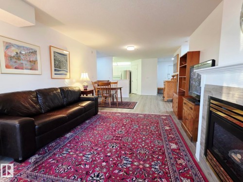 327 6703 172 Street, Edmonton, AB - Indoor Photo Showing Living Room With Fireplace