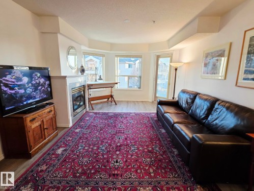 327 6703 172 Street, Edmonton, AB - Indoor Photo Showing Living Room With Fireplace