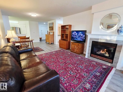 327 6703 172 Street, Edmonton, AB - Indoor Photo Showing Living Room With Fireplace