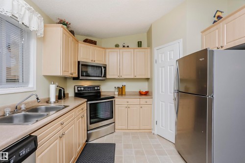 10105 105 Street, Morinville, AB - Indoor Photo Showing Kitchen With Stainless Steel Kitchen With Double Sink