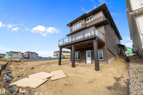Back of property featuring a balcony, a patio area, and a residential view - 4544 Kinsella Link, Edmonton, AB - Outdoor