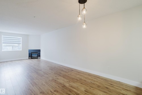506 9919 105 Street, Edmonton, AB - Indoor With Fireplace