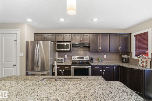 1711 56 Street Sw, Edmonton, AB - Indoor Photo Showing Kitchen With Stainless Steel Kitchen With Double Sink With Upgraded Kitchen