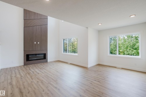 2512 213 Street, Edmonton, AB - Indoor Photo Showing Living Room With Fireplace