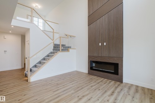 2512 213 Street, Edmonton, AB - Indoor Photo Showing Other Room With Fireplace