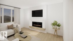 Living room with wood finished floors and a lit fireplace - 