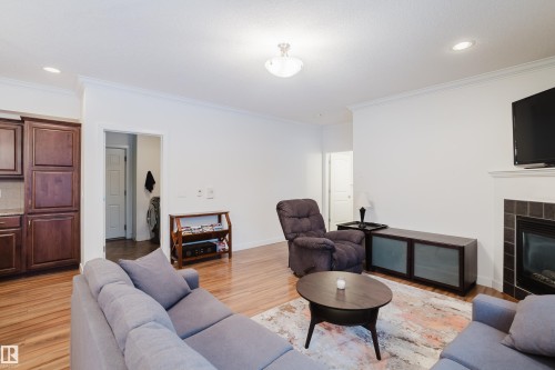98 7293 South Terwillegar Drive, Edmonton, AB - Indoor Photo Showing Living Room With Fireplace