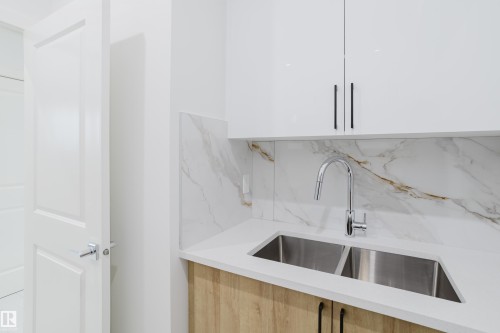 942 18 Avenue, Edmonton, AB - Indoor Photo Showing Kitchen With Double Sink