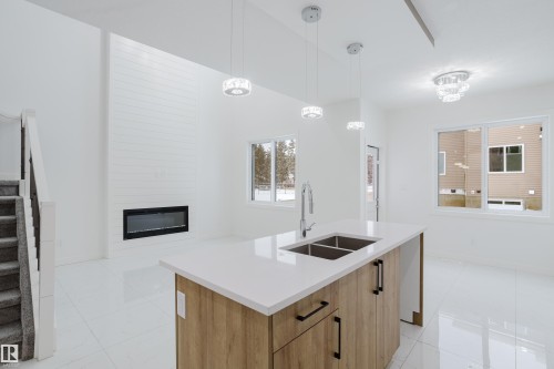 942 18 Avenue, Edmonton, AB - Indoor Photo Showing Kitchen With Double Sink