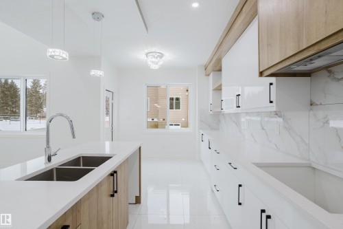 942 18 Avenue, Edmonton, AB - Indoor Photo Showing Kitchen With Double Sink