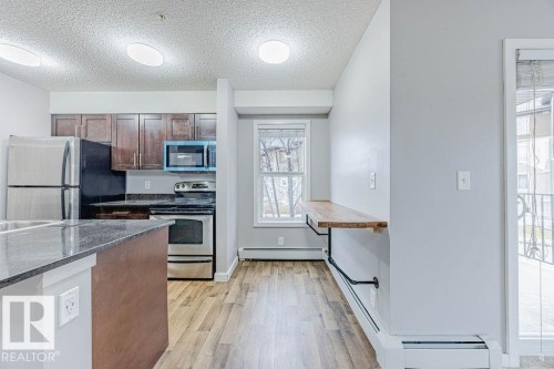 219 530 Watt Boulevard, Edmonton, AB - Indoor Photo Showing Kitchen With Stainless Steel Kitchen