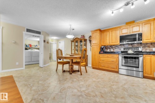 407 17407 99 Avenue, Edmonton, AB - Indoor Photo Showing Kitchen With Upgraded Kitchen