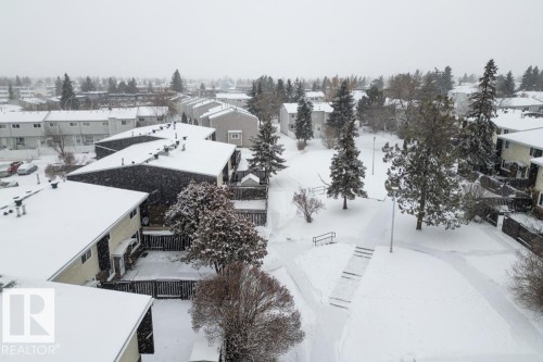 Snowy aerial view featuring a residential view - 196 Roseland Village, Edmonton, AB - Outdoor