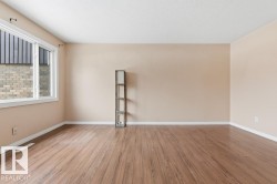 Empty room featuring light wood-style floors - 