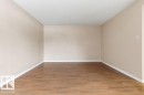 Unfurnished room featuring light wood-type flooring - 196 Roseland Village, Edmonton, AB  - Indoor Photo Showing Other Room 