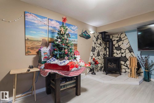 4032 77 Street, Edmonton, AB - Indoor With Fireplace