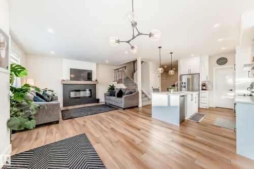 520 Bluff Lane, Leduc, AB - Indoor With Fireplace