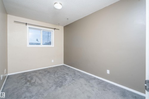 111 230 Edwards Drive, Edmonton, AB - Indoor Photo Showing Other Room