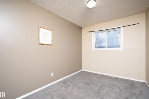 111 230 Edwards Drive, Edmonton, AB - Indoor Photo Showing Other Room