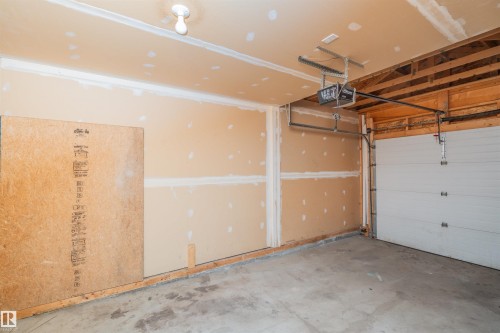 111 230 Edwards Drive, Edmonton, AB - Indoor Photo Showing Garage