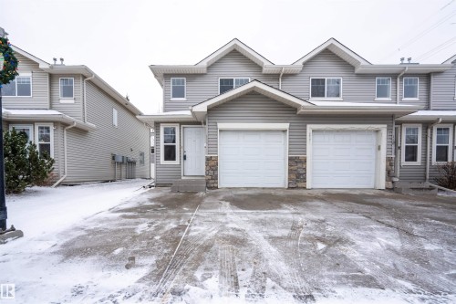 111 230 Edwards Drive, Edmonton, AB - Outdoor With Facade