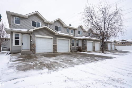 111 230 Edwards Drive, Edmonton, AB - Outdoor With Facade