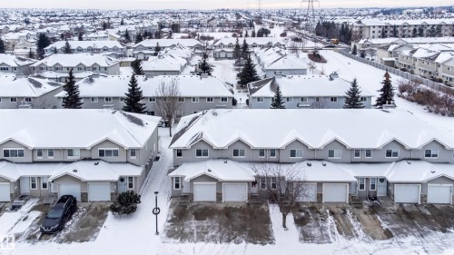 111 230 Edwards Drive, Edmonton, AB - Outdoor With Facade