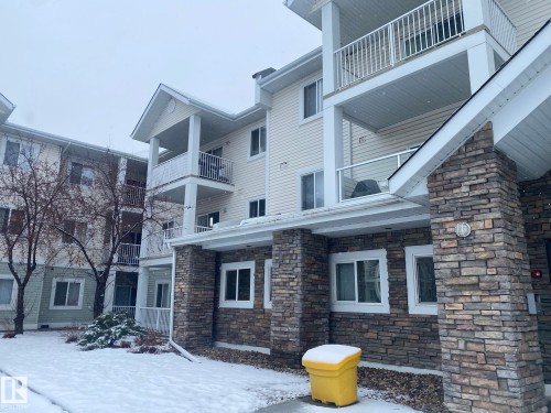 Snow covered property featuring a view of apartment building / complex - 336 9525 162 Avenue, Edmonton, AB - Outdoor With Balcony